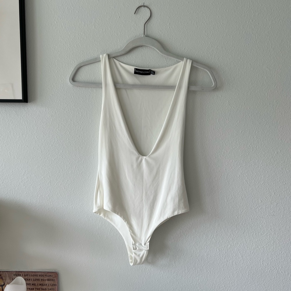 White plunging bodysuit